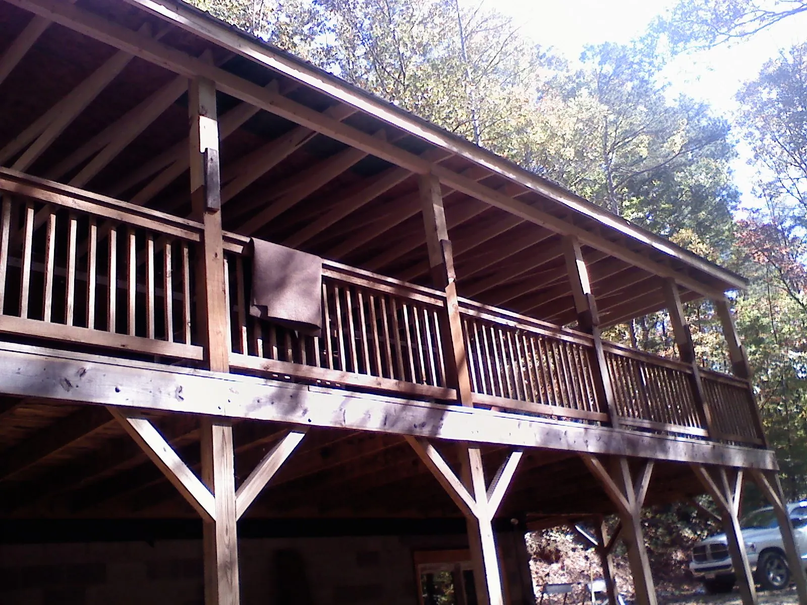 Timber framing under a new elevated porch and deck — Roof Leak Repair in Springfield by Roofing Brothers